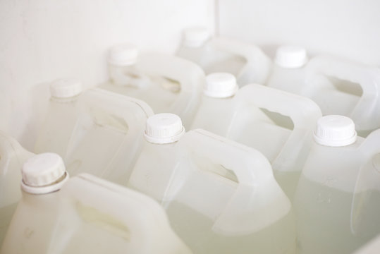 White Plastic Canister With Liquid