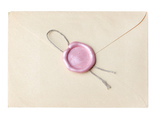 old mail envelope with pink wax seal stamps isolated on white