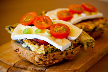 Sandwiches on wooden background