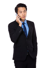Fototapeta premium Businessman talk to mobile phone