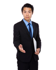 Businessman with laptop and give hand