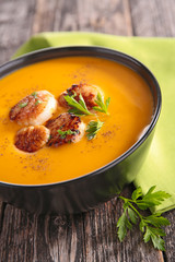 cream of pumpkin soup with scallops