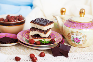 three pieces of shortcake cake with nuts and chocolate