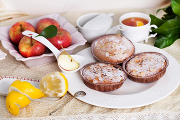 three mini charlotte cake with apple and almonds