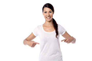 Pretty  woman pointing her stomach