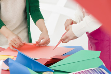 Women to work in colored paper