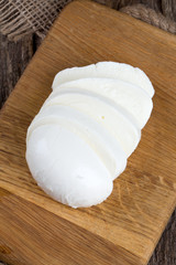 mozzarella cheese on wooden table