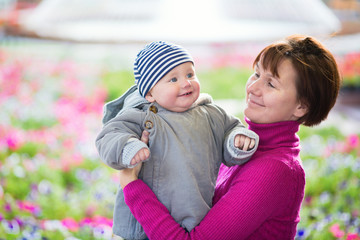 Grandmother and grandson in cafe