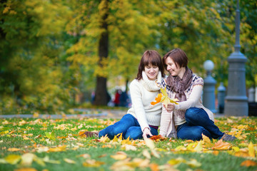 Fototapeta premium Mother and daughter on a bright fall day