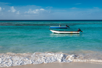 Fototapeta na wymiar Boats in turquoise waters of Barbados