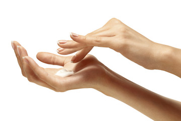 Moisturizer cream on beautiful female hands isolated