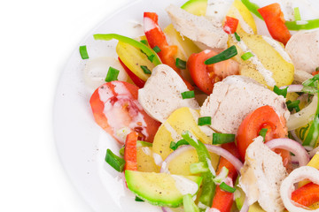 Warm meat salad with vegetables.