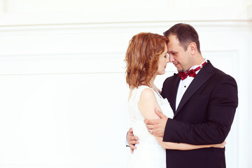Bridal couple kissing lovely wedding day
