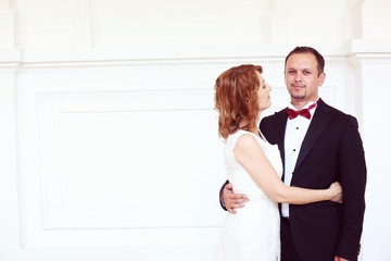 Bridal couple kissing lovely wedding day