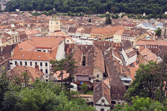 image of roof tops and Piata Sfatului (Council Square) in Brasov