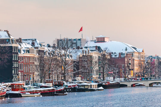 Amsterdam winter view with the river Amstel in front