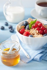 healthy breakfast with cornflakes and berry