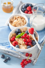 healthy breakfast with cornflakes and berry