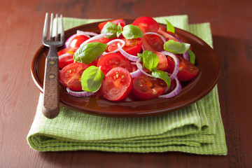healthy tomato salad with onion basil olive oil and balsamic vin