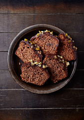 Chocolate cake with glaze and orange peel