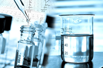 Laboratory research, dropping liquid to test tube