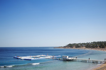 Beautiful blue sea and a large pontoon