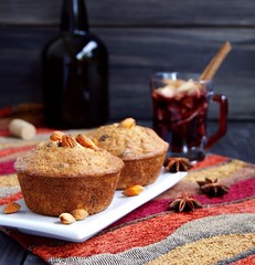 cup of hot Christmas mulled wine with cake