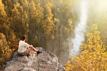 Hike tourist looks at beautiful view