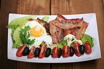 English breakfast with fried eggs and bacon