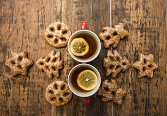 Tea with lemon and cookies