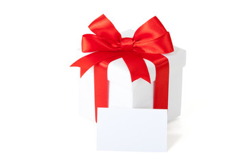 gift box with red ribbon and teg