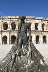 Statue of famous bullfighter in front of the arena in Nimes