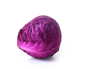 Head of red cabbage over white.