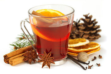 glass of mulled wine and spices