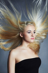 beautiful woman.healthy hair.Beauty salon.flying hair