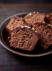 Chocolate cake with glaze and orange peel