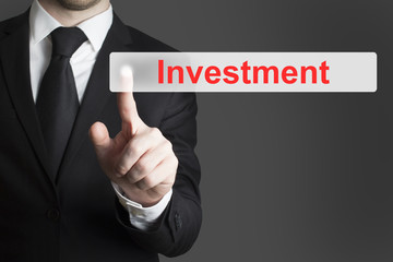 businessman pushing flat button investment