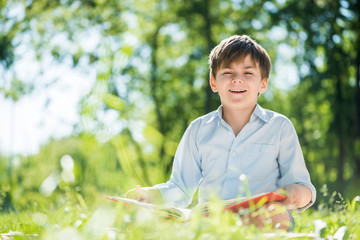Boy in summer park
