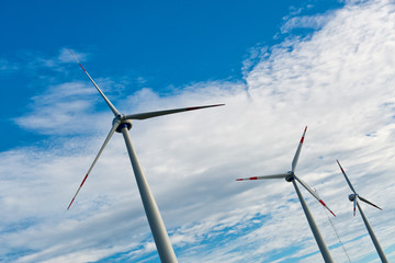 Row of wind turbines on a wind farm
