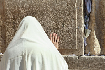 Orthodox Jewish man pray at the Wailing wall