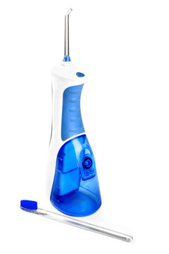 Oral irrigator and toothbrush