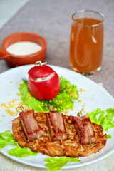 veal meat with bacon