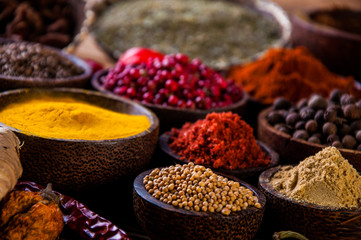 Wooden table of traditional Asian spices