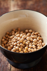 Bowl of raw chickpeas; close up