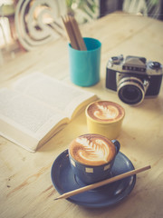 cup of coffee in coffee shop vintage color tone