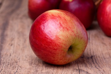 Fototapeta na wymiar Sweet apples on wooden background