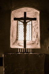 Crusifix in front of light