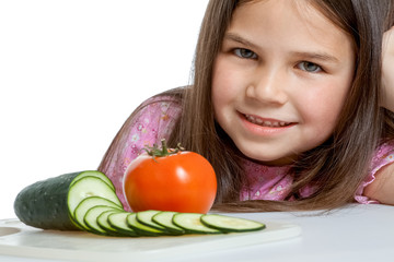 Beautiful little childl with vegetable