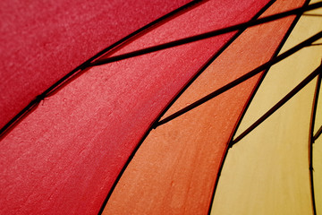 A close up shot of Rainbow coloured umbrella