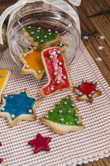 Christmas handmade cookies on wooden background